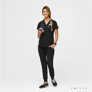 FIGS Scrubs Catarina™ One-Pocket Scrub Top, and Zamora™ Jogger Scrub Pants.